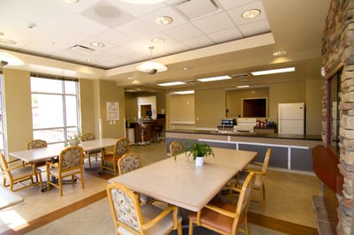 Bright common area with tables and seating