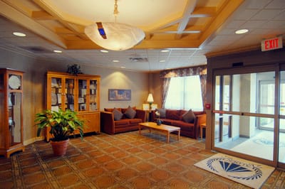 Cozy lobby area with seating and plants