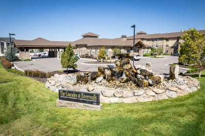 Exterior view of Cascades at Riverwalk with decorative fountain