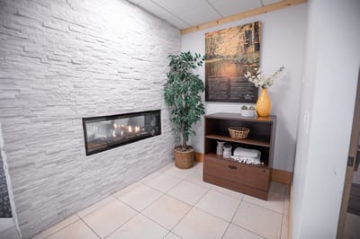 Cozy interior corner with a fireplace and decorations