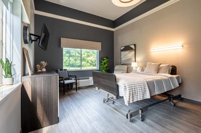 Well-furnished private resident room with natural light
