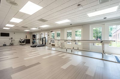 Bright interior of a rehabilitation gym with equipment