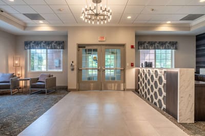 Interior view of a welcoming lobby with seating