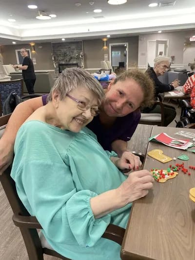 Residents engaging in creative activity at a common area