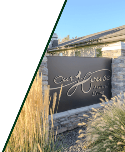 Facility logo on a stone and grass background