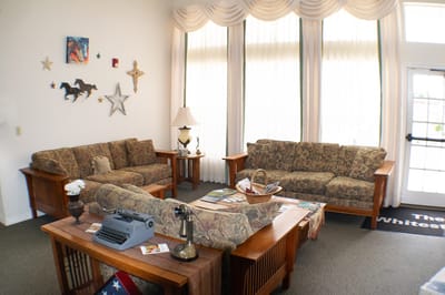 Comfortable lounge area with sofas and decor