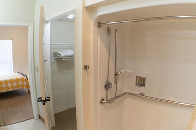 Interior view of a resident bathroom with shower