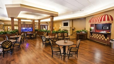 Interior view of a dining area with tables and chairs