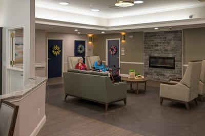 Residents enjoying time in a common area lounge