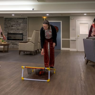 Residents participating in an indoor activity session
