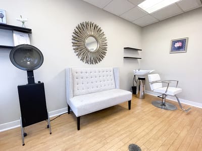 Interior view of a salon area with seating