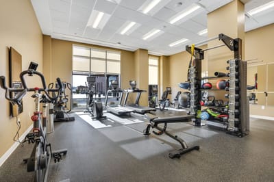 Interior view of a gym area with exercise equipment