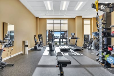Interior fitness room with exercise equipment