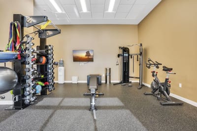 Interior view of a fitness area with exercise equipment
