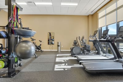Interior view of a fitness area with exercise equipment