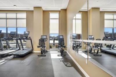 Interior view of a fitness room with exercise equipment