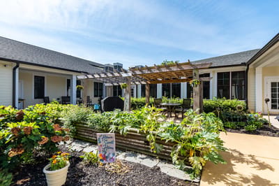 Outdoor courtyard with garden and seating area