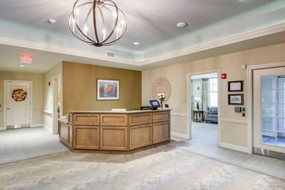 Reception area with a front desk and seating