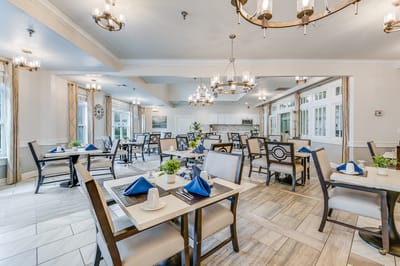 Dining room setup with elegant decor and tables
