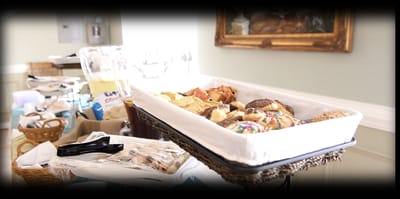 Assorted pastries and treats displayed in a common area