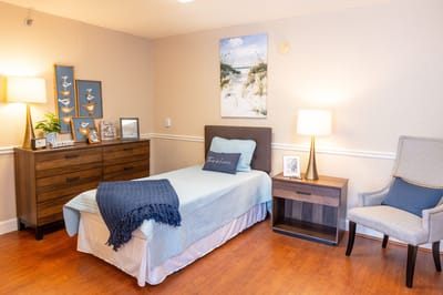 Cozy private resident room with a bed and decorations