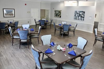 Well-decorated dining room with set tables