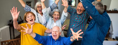 Residents celebrating together in a common area