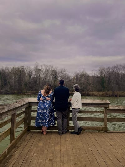 People enjoying a serene view by the river