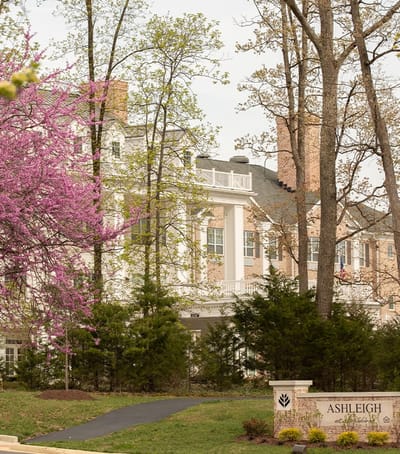 Exterior view of Ashleigh facility with surrounding trees