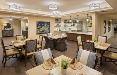 Elegant dining room setup with tables and decor