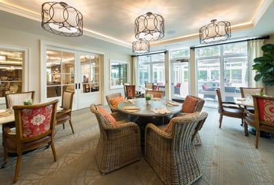 Bright dining room with elegant decor and seating