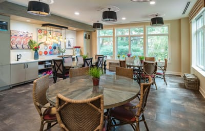 Bright common area with tables and chairs
