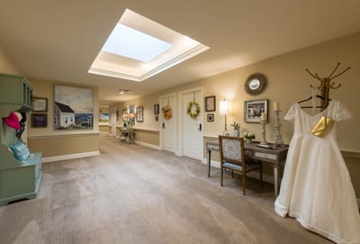 Interior hallway with decor and natural light