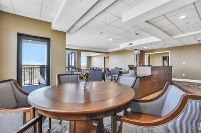 Interior view of a common area with a dining table