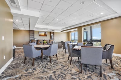 Interior view of a common area with tables and chairs