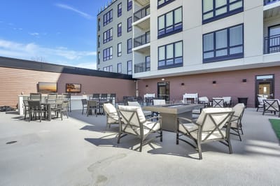 Outdoor seating area with chairs and tables
