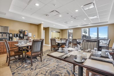 Dining area with tables and coffee station