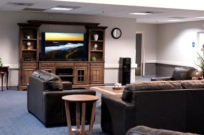 Interior common area with seating and television
