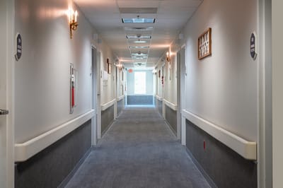 Bright corridor with natural light and wall decorations