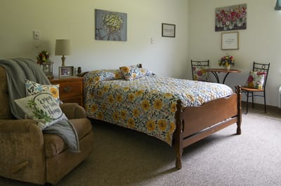 Cozy private resident room with floral decor