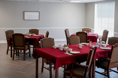 Dining area with tables set for meals