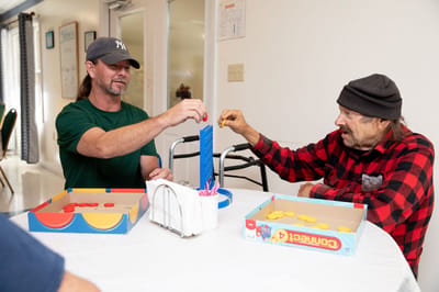 Residents engaging in a game at the facility