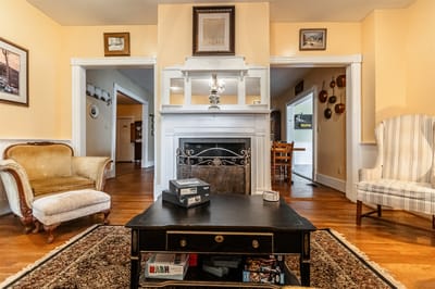 Cozy common area with seating and a fireplace