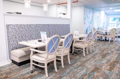 Interior dining area with tables and chairs