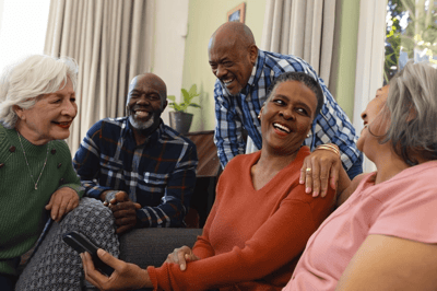 Residents enjoying a conversation in a common area