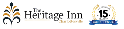 The Heritage Inn logo with decorative elements