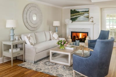 Cozy common area with seating and a fireplace