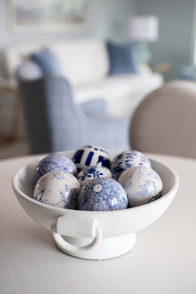 Decorative bowl with blue patterned decorative spheres