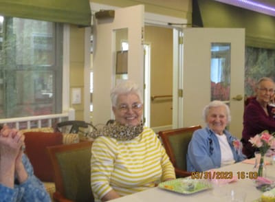 Residents enjoying a meal in a common area
