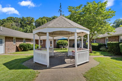 Outdoor gazebo in a landscaped courtyard